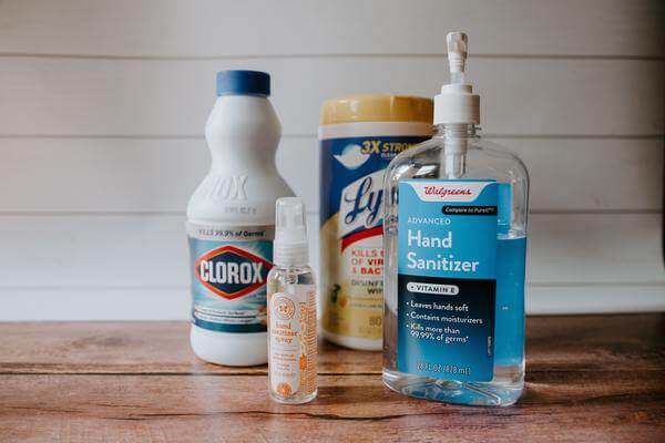 Sanitation stations and antimicrobial materials
